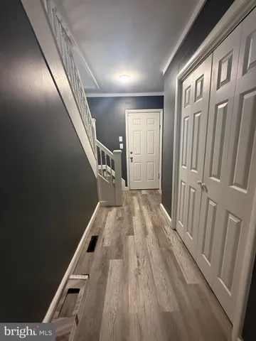 a view of entryway with stairs