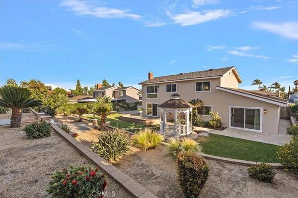 a view of a house with swimming pool