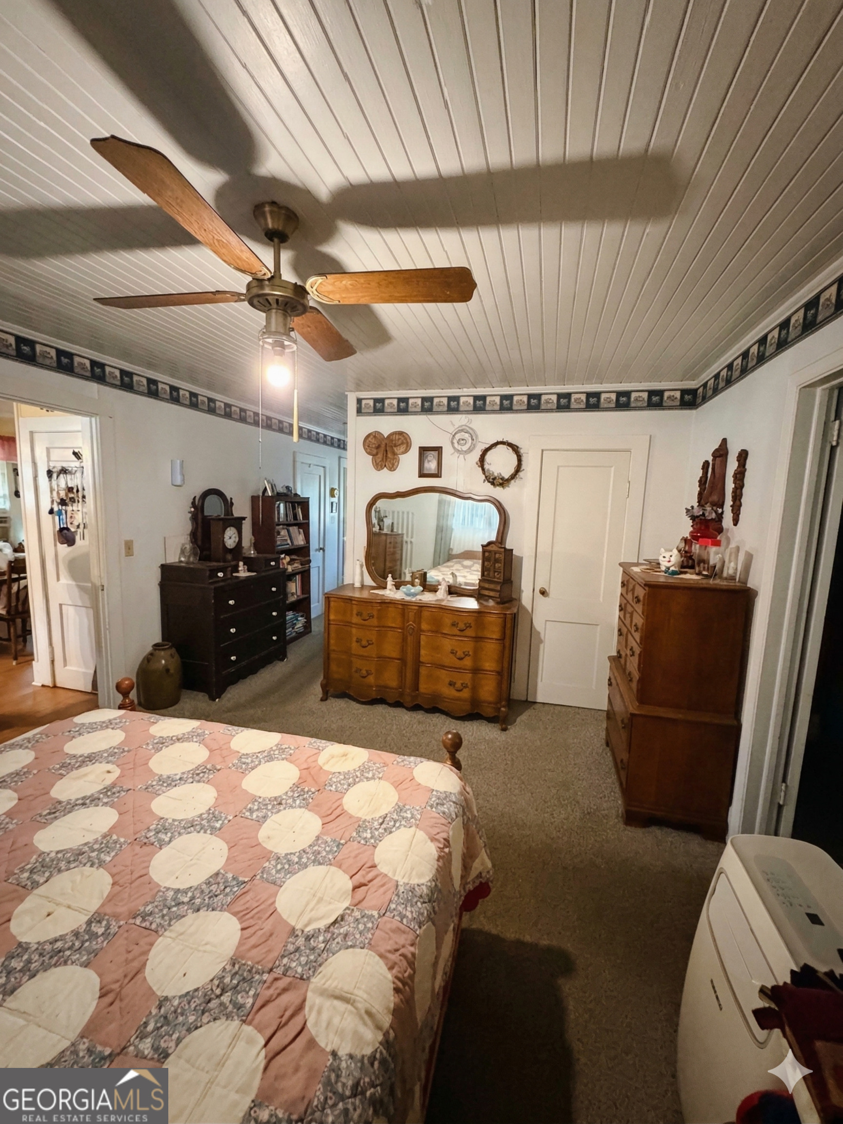 32737 Highway 48 Graham, AL 36263 - Photo 13 of 69 a bed room with a bed and a television
