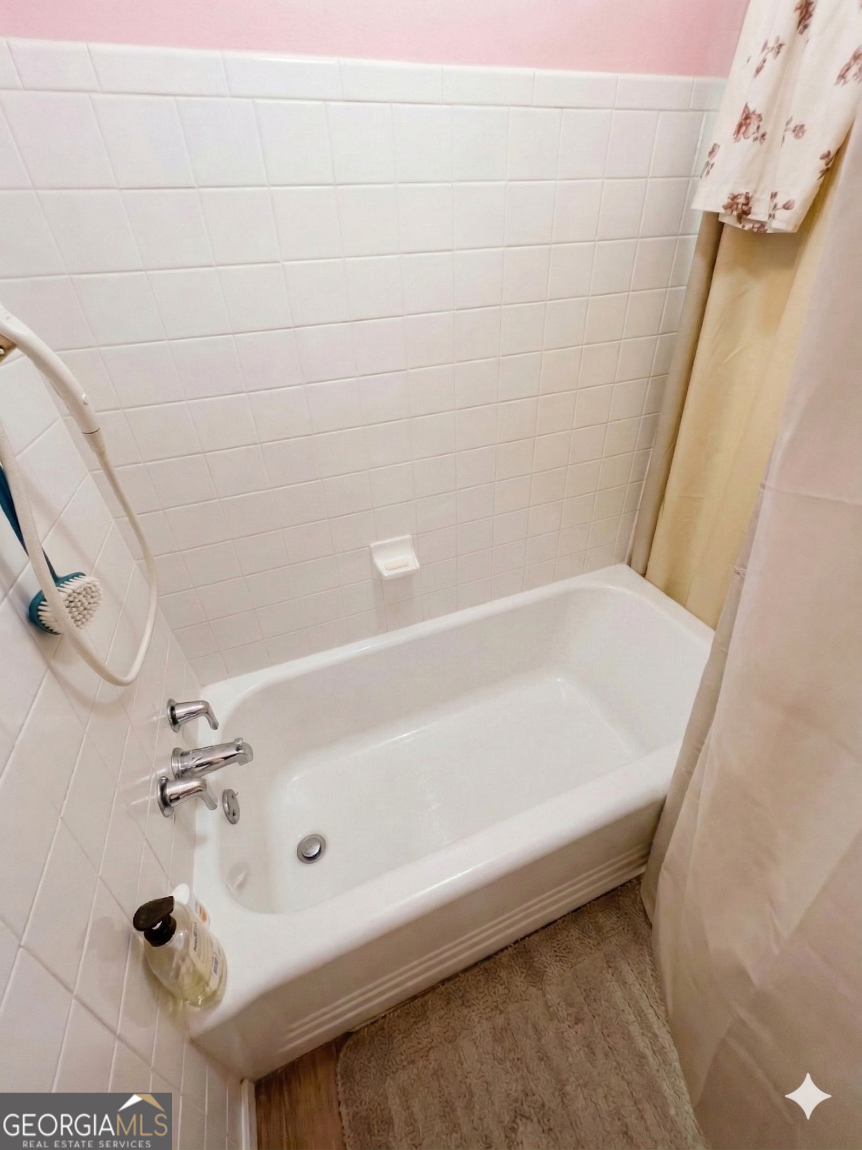 32737 Highway 48 Graham, AL 36263 - Photo 16 of 69 a bathroom with a bathtub