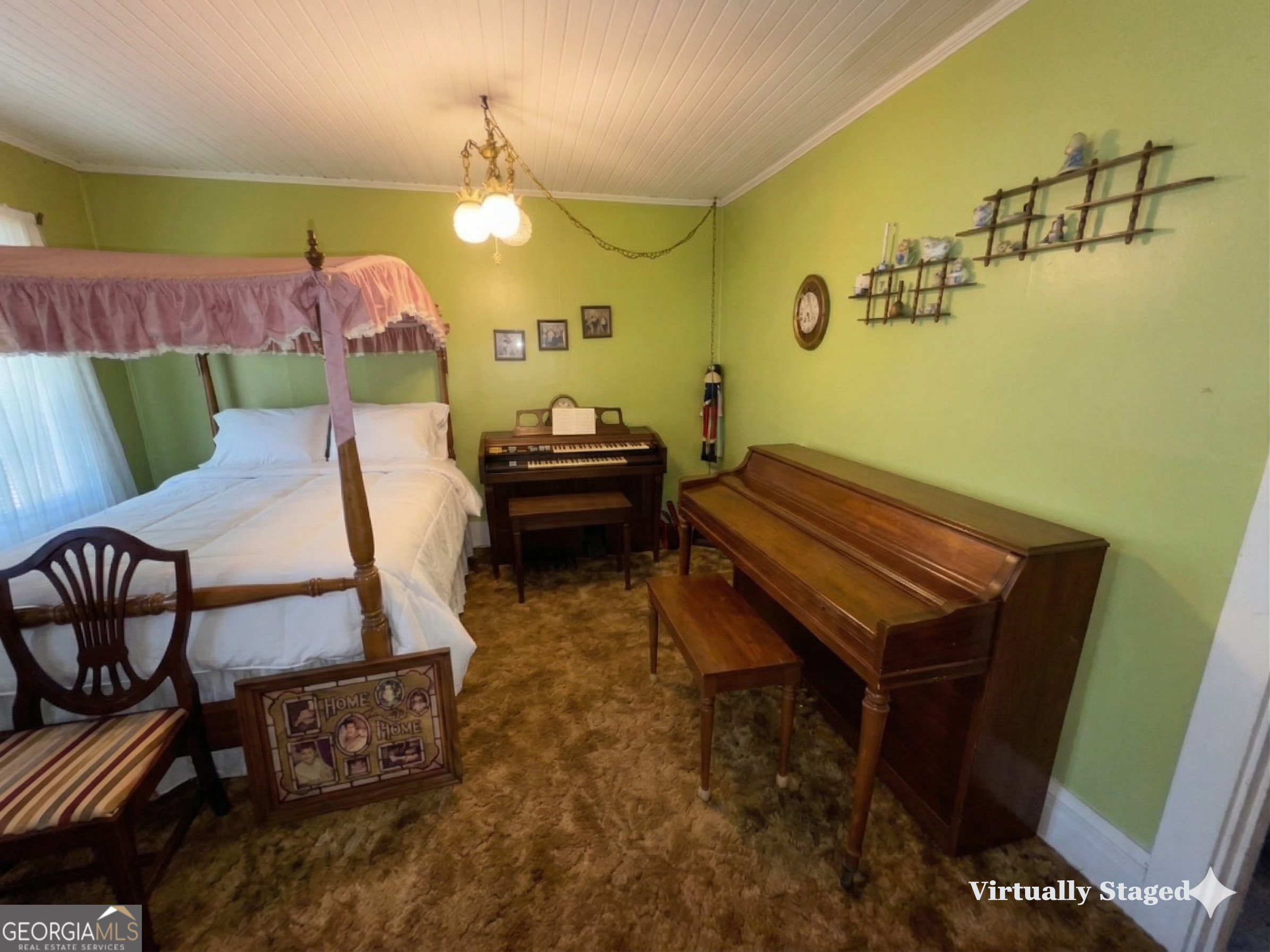 32737 Highway 48 Graham, AL 36263 - Photo 22 of 69 a living room with a table chairs and a wooden floor