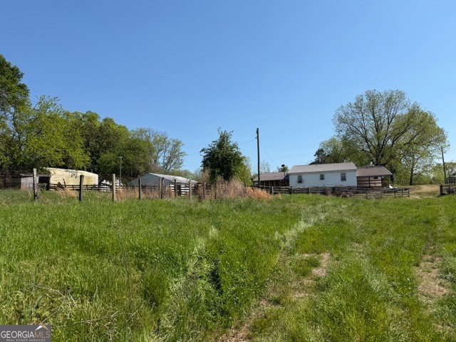 32737 Highway 48 Graham, AL 36263 - Photo 46 of 69 a green field with lots of trees in it