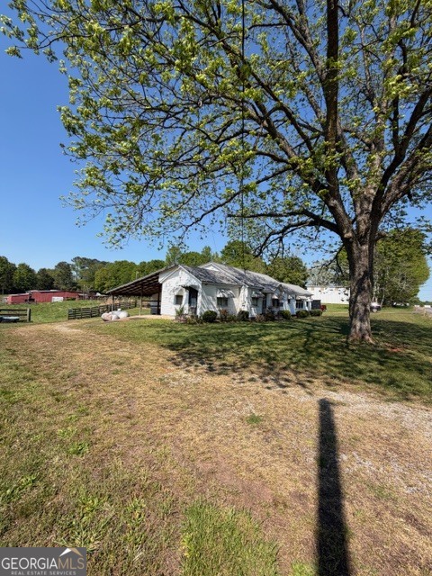 32737 Highway 48 Graham, AL 36263 - Photo 56 of 69 a front view of a house with a yard