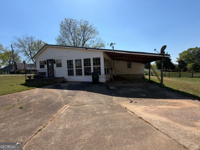 32737 Highway 48 Graham, AL 36263 - Photo 62 of 69 a front view of a house with a yard
