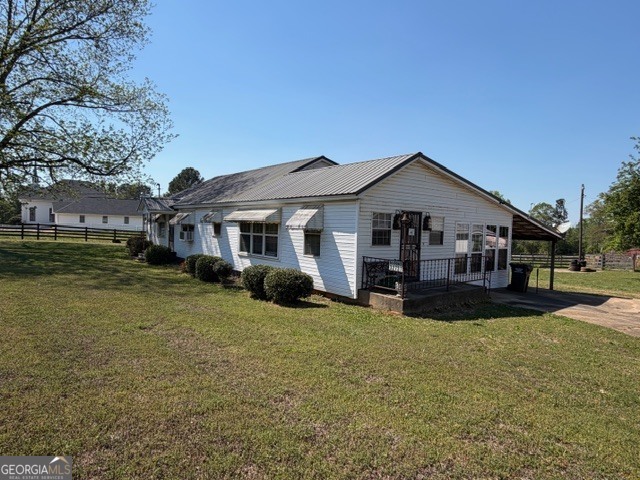 32737 Highway 48 Graham, AL 36263 - Photo 63 of 69 a front view of a house with garden