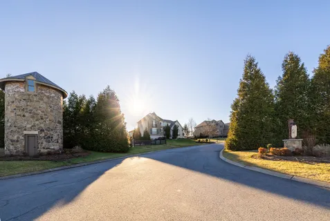 a view of a swimming pool with an outdoor space and seating area