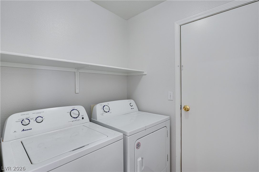 9660 Crystal Ridge Road Las Vegas, NV 89123 - Photo 5 of 13 A dedicated utility space, providing convenient laundry facilities.