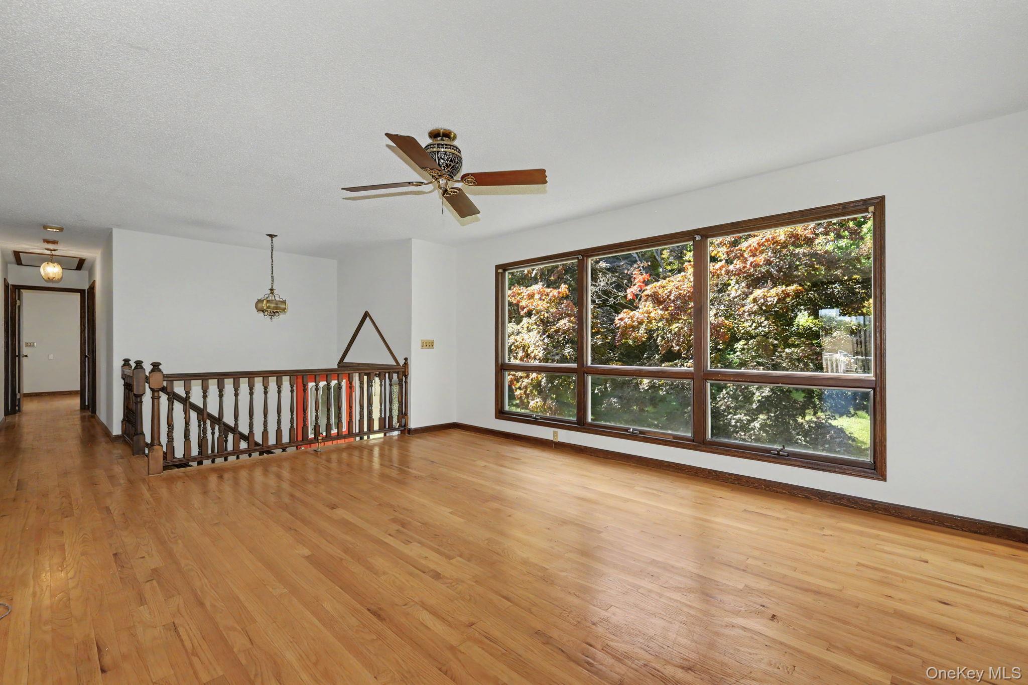 214 Starr Ridge Road Brewster, NY 10509 - Photo 6 of 37 Living room with large windows and hardwood floors