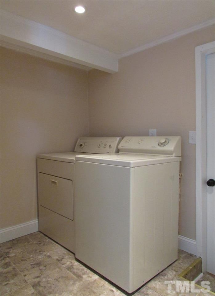 414 McGhees Mill Road Roxboro, NC 27574 - Photo 14 of 22 a utility room with dryer and washer