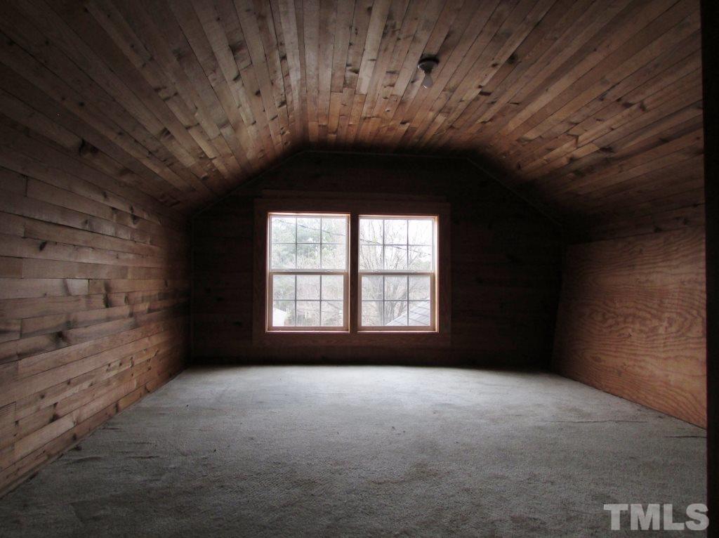 414 McGhees Mill Road Roxboro, NC 27574 - Photo 15 of 22 a view of an empty room with a window