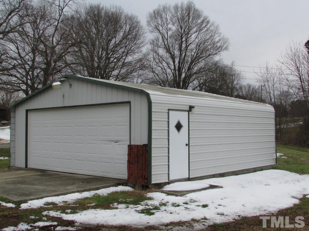 414 McGhees Mill Road Roxboro, NC 27574 - Photo 20 of 22 a view of a garage