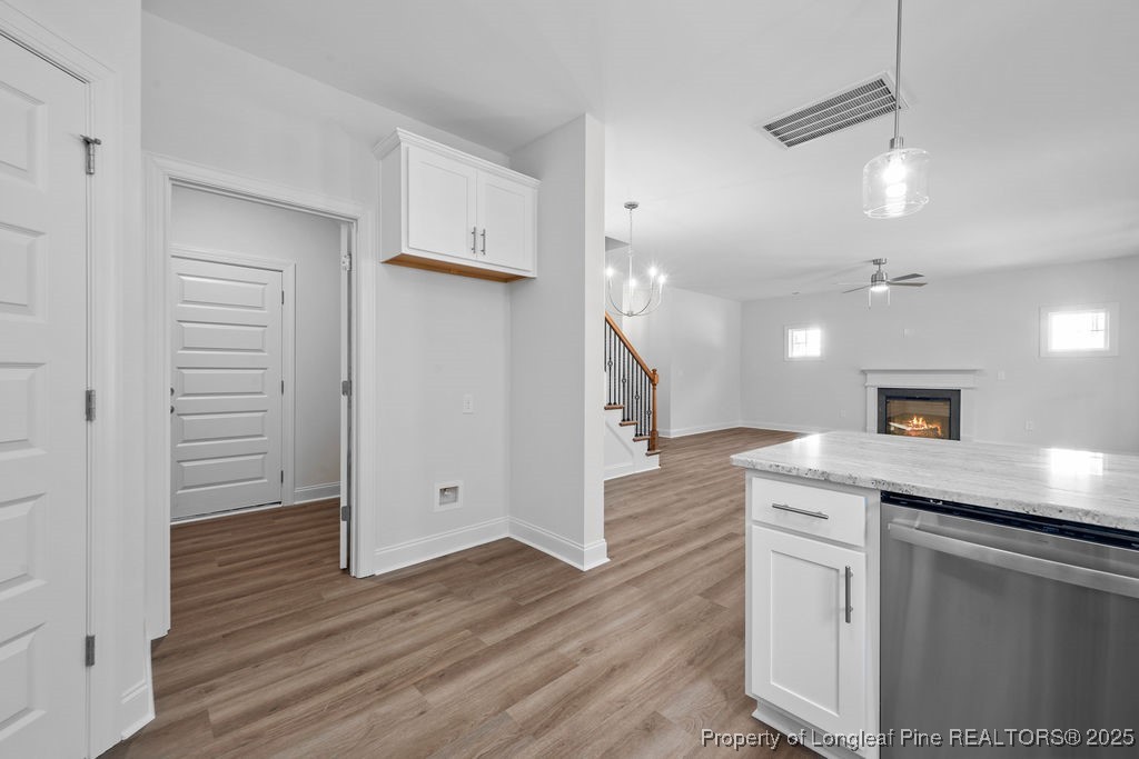 1004 Rhum Drive Fayetteville, NC 28311 - Photo 13 of 34 a view of a kitchen with a sink and a refrigerator