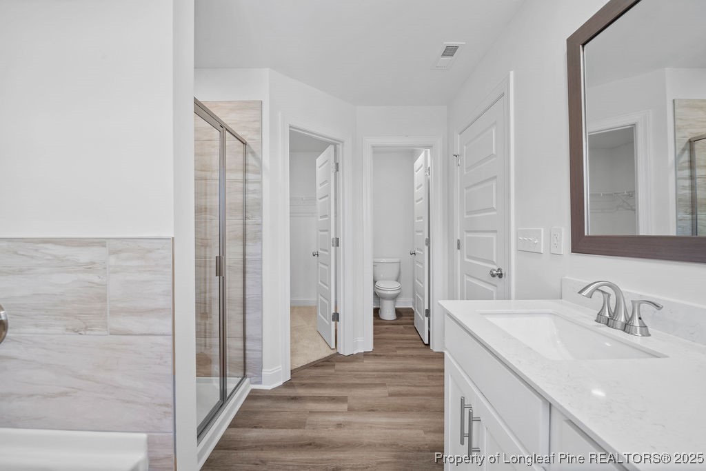 1004 Rhum Drive Fayetteville, NC 28311 - Photo 20 of 34 a bathroom with a sink and a mirror
