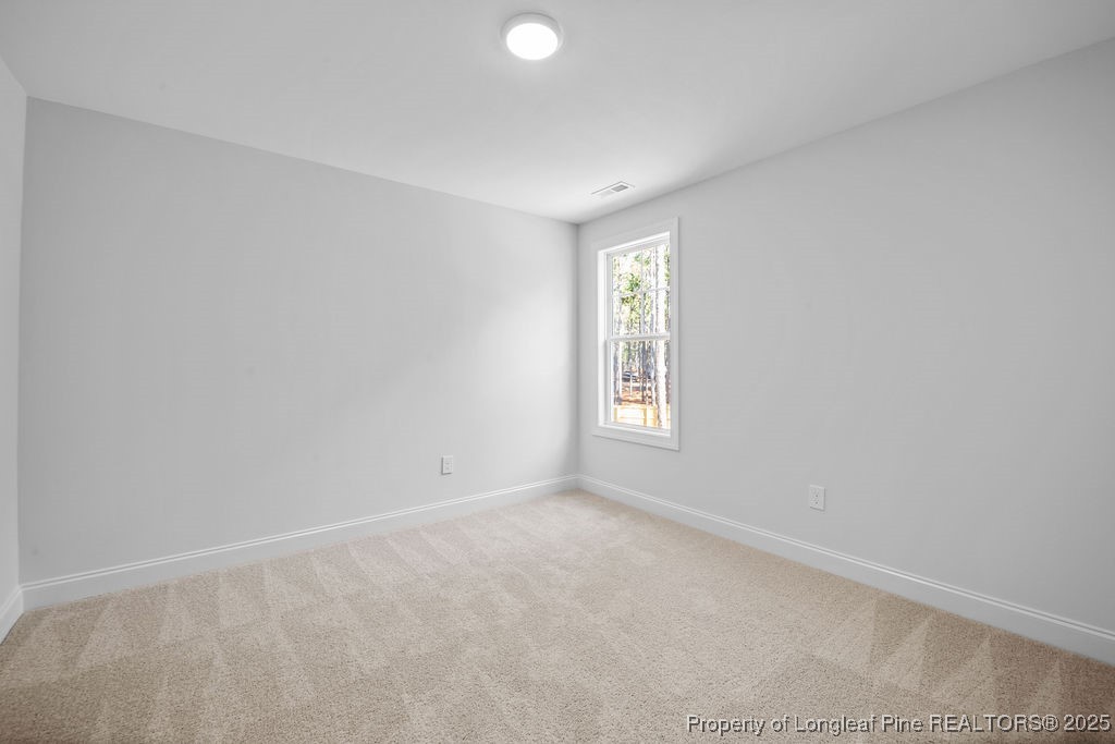 1004 Rhum Drive Fayetteville, NC 28311 - Photo 24 of 34 an empty room with windows