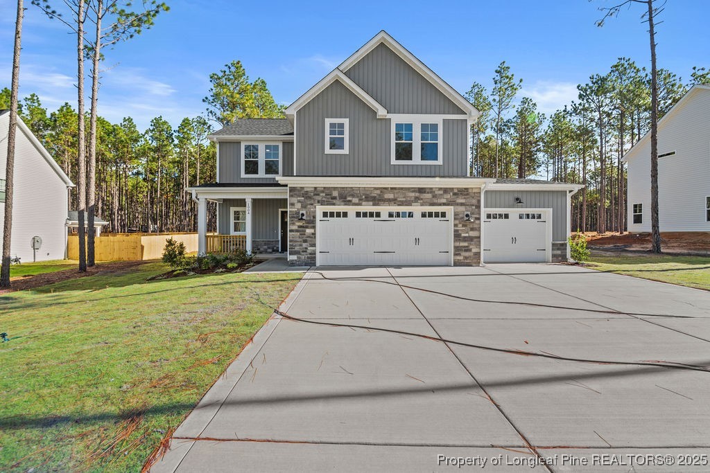 1004 Rhum Drive Fayetteville, NC 28311 - Photo 31 of 34 a front view of a house with a yard