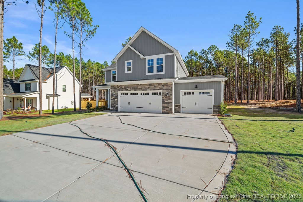 1004 Rhum Drive Fayetteville, NC 28311 - Photo 32 of 34 a front view of a house with a yard