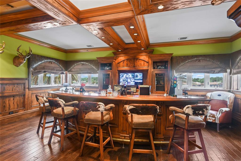 56230 Redbud Road Astor, FL 32102 - Photo 24 of 44 a dining room with furniture and wooden floor