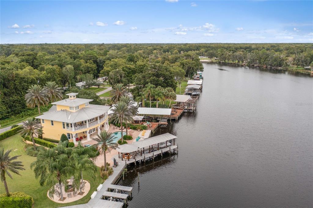 56230 Redbud Road Astor, FL 32102 - Photo 31 of 44 a view of a lake with a mountain