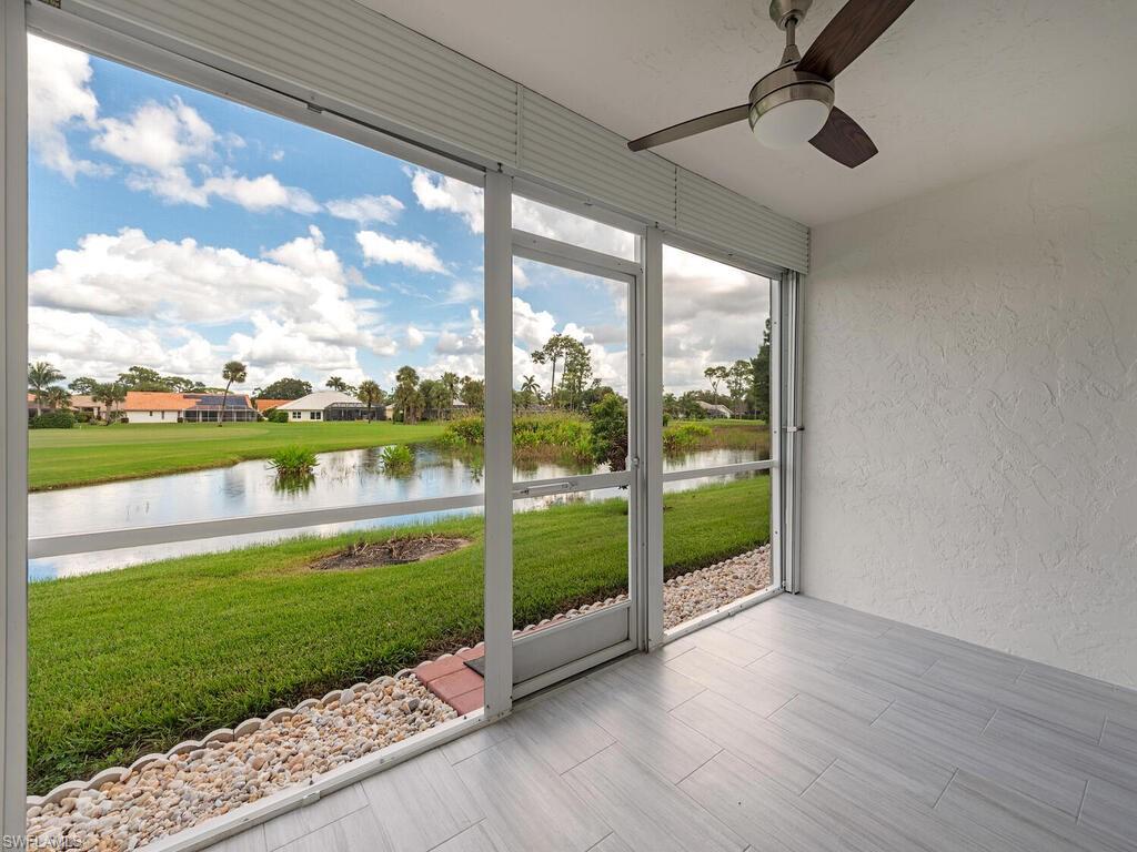 760 Augusta Boulevard, Unit D101 Naples, FL 34113 - Photo 12 of 13 a view of a porch and garden