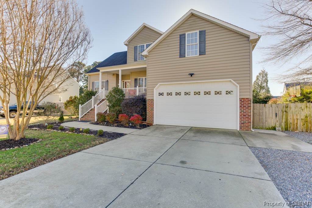 4 Willow Road Hampton, VA 23664 - Photo 4 of 48 Front facade featuring a garage and a porch