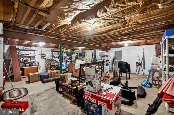 a view of a backyard with a small cabin