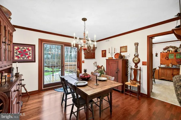 a room with furniture and a large window