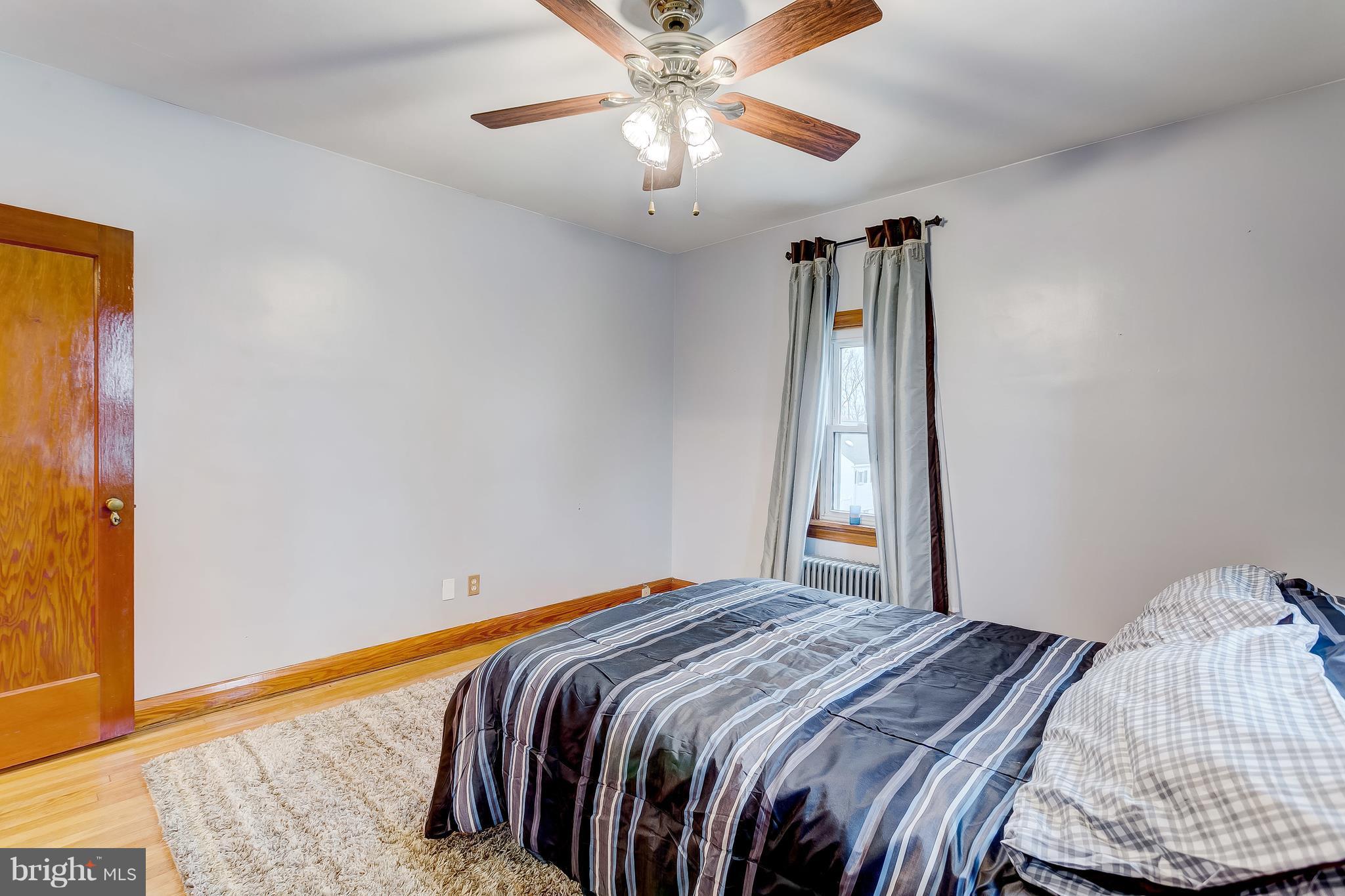 2602 Wentworth Road Baltimore, MD 21234 - Photo 12 of 28 1st Bedroom Hardwoods & Hunter Ceiling Fan