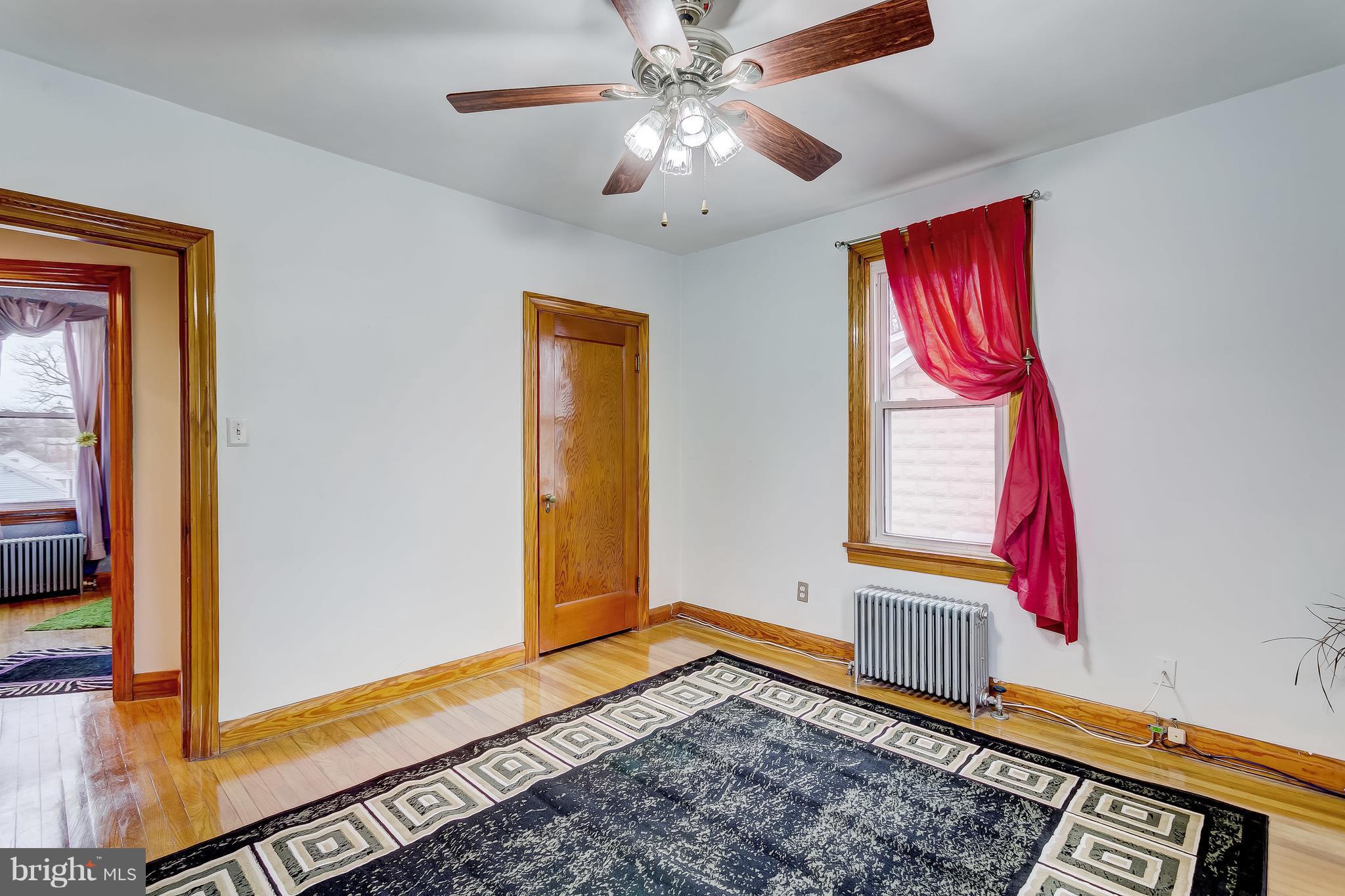 2602 Wentworth Road Baltimore, MD 21234 - Photo 14 of 28 2nd Bedroom Hardwoods & Hunter Ceiling Fan