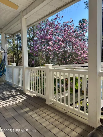 a view of a balcony with a garden