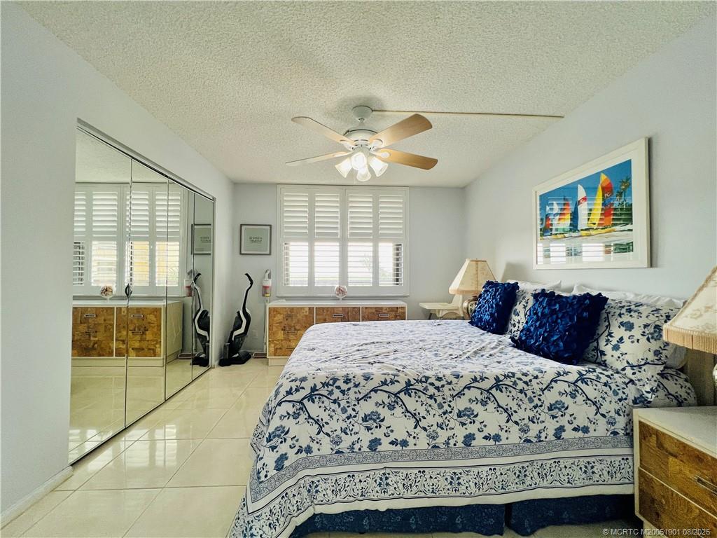 9500 South Ocean Drive, Unit 809 Jensen Beach, FL 34957 - Photo 21 of 64 a bedroom with a large bed and a window