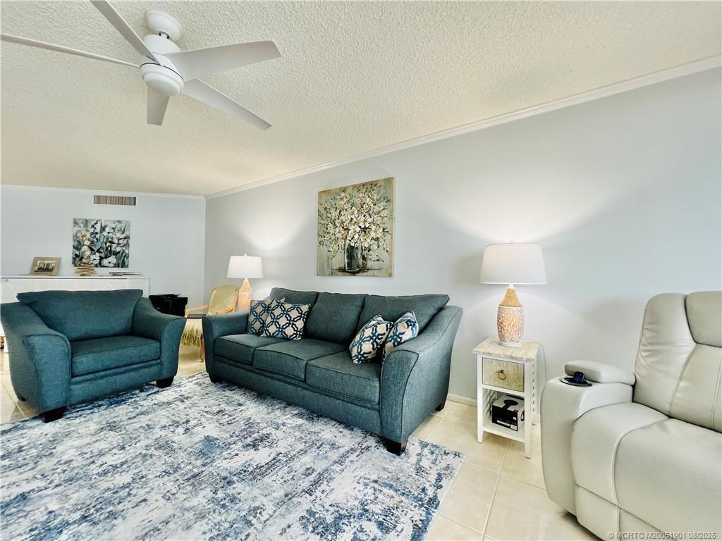 9500 South Ocean Drive, Unit 809 Jensen Beach, FL 34957 - Photo 31 of 64 a living room with furniture and a couch