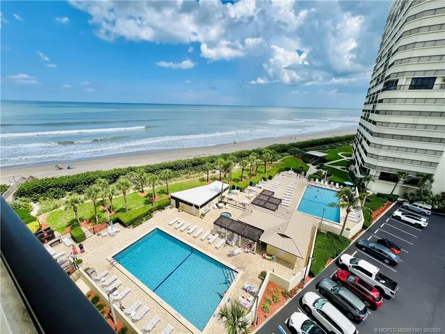 a bathroom with a shower a toilet and a sink