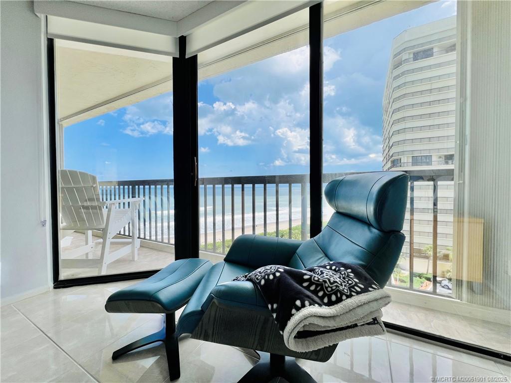 9500 South Ocean Drive, Unit 809 Jensen Beach, FL 34957 - Photo 50 of 64 a living room with furniture and a large window