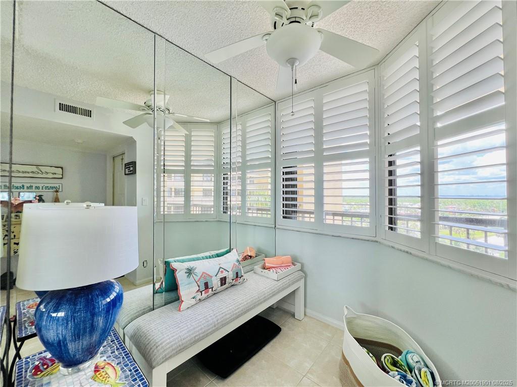 9500 South Ocean Drive, Unit 809 Jensen Beach, FL 34957 - Photo 6 of 64 a living room with furniture and a window