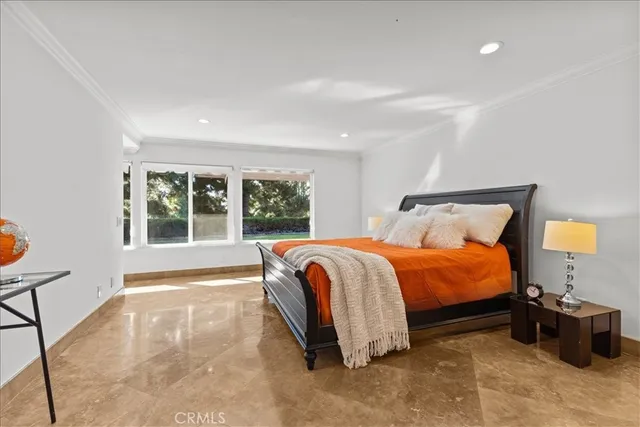a spacious bathroom with a double vanity sink a mirror and a bathtub