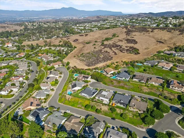 a view of a golf course with a lake