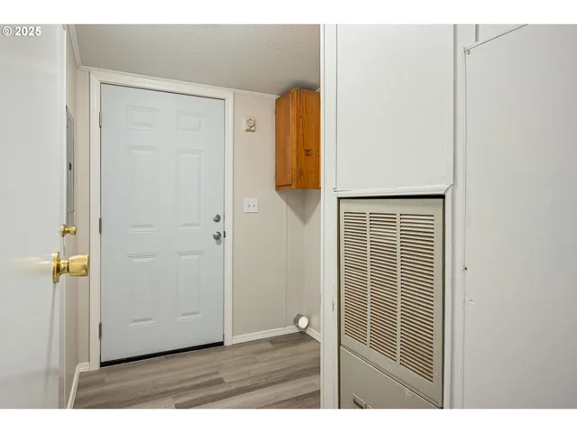 a view of small space with wooden floor