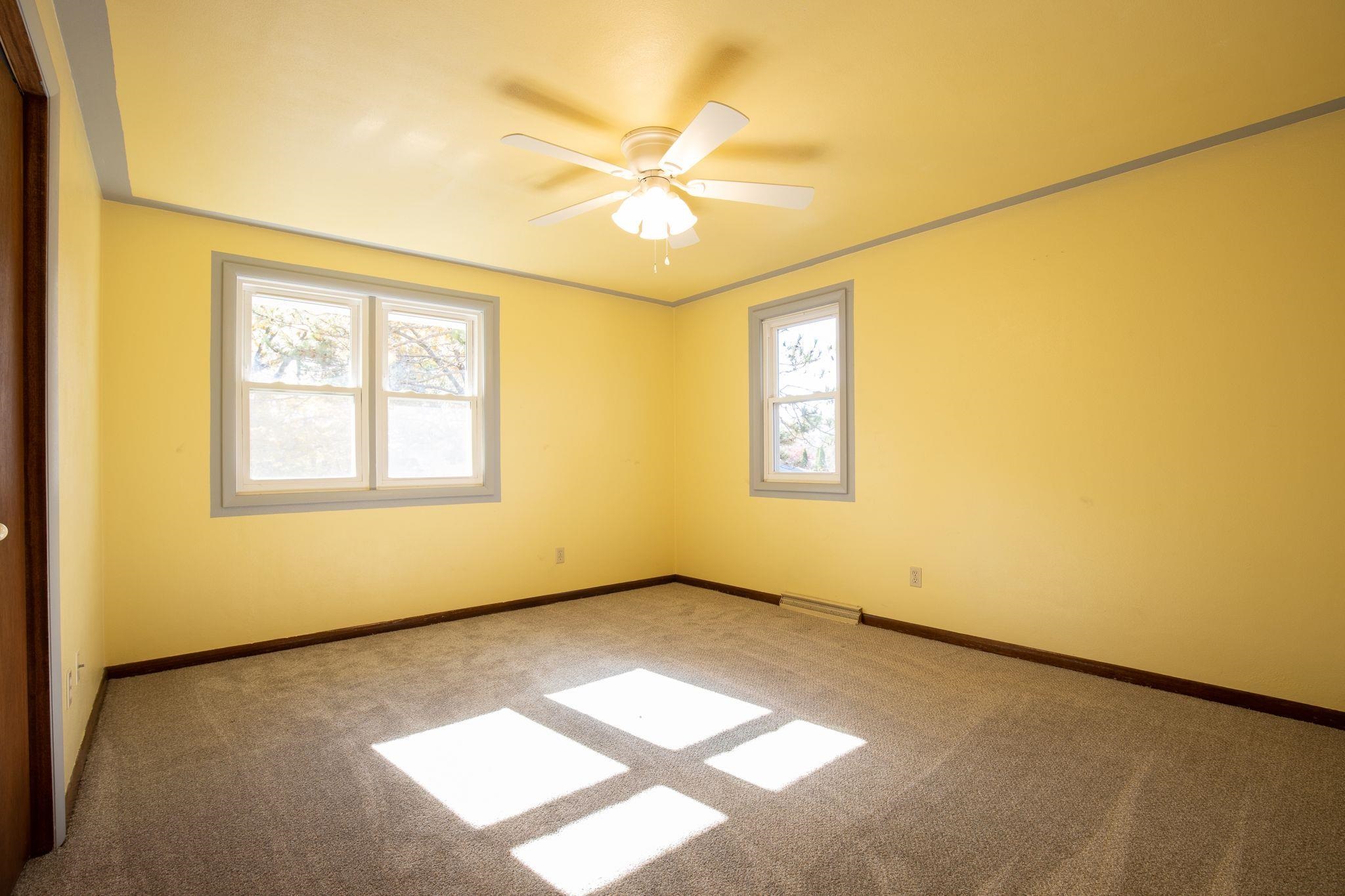 4962 Braewild Road Rockford, IL 61107 - Photo 13 of 20 a view of an empty room with a window