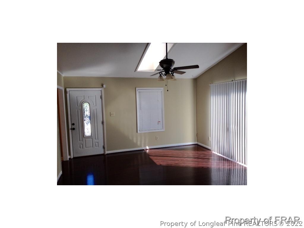 1786 Arrow Ridge Way Fayetteville, NC 28304 - Photo 2 of 17 a view of an empty room with wooden floor