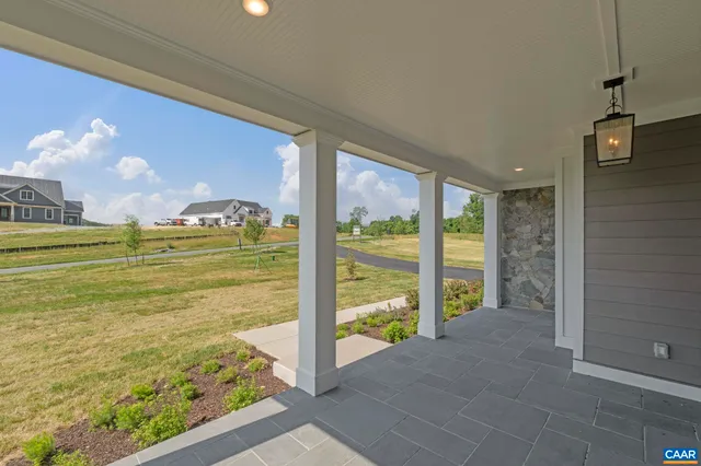 a view of a balcony with an ocean view