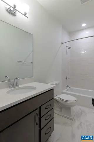 a view of a backyard with a lake view