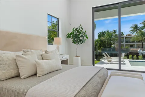 a white bath tub sitting next to a white toilet