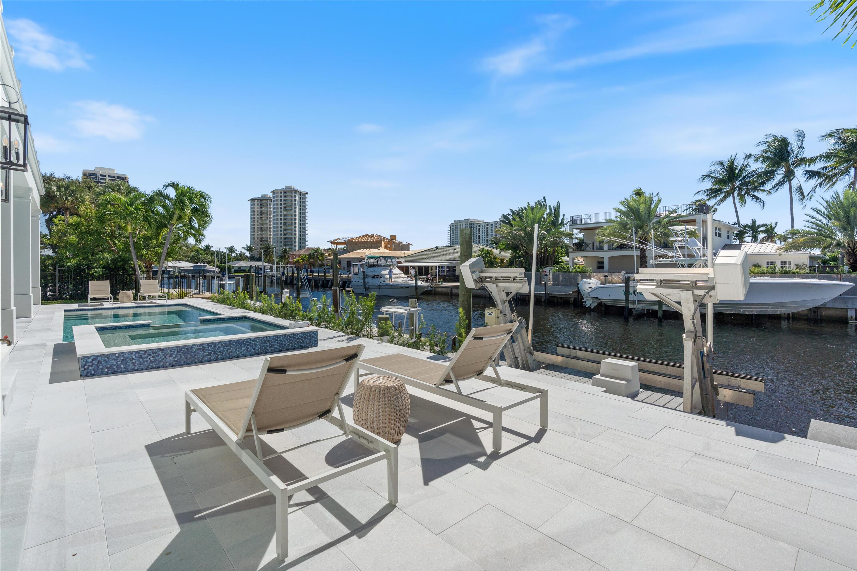 1211 Gulfstream Way Singer Island, FL 33404 - Photo 42 of 54 a view of a lake with sitting area