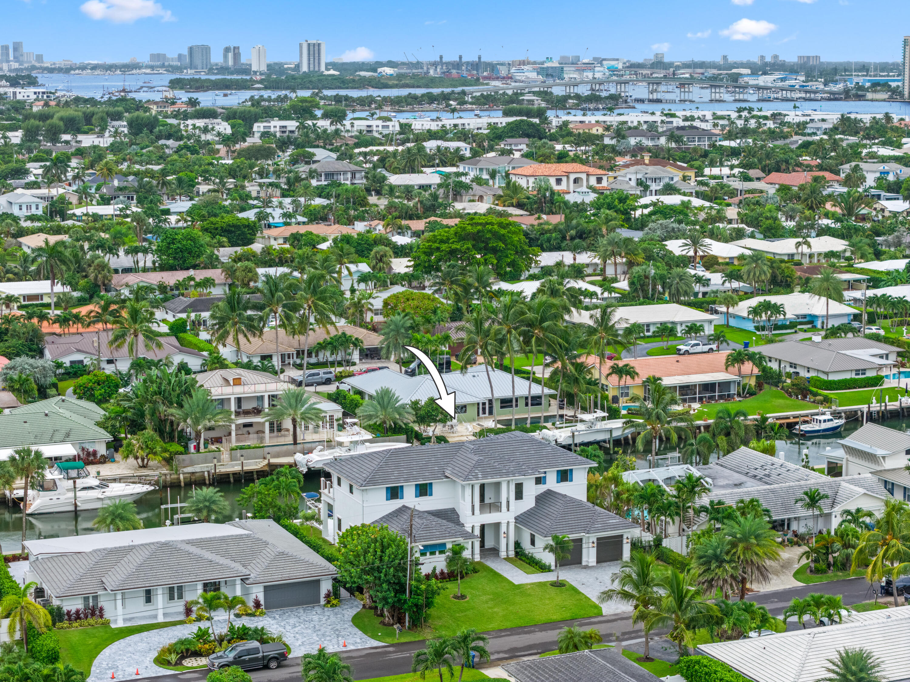 1211 Gulfstream Way Singer Island, FL 33404 - Photo 50 of 54 an aerial view of residential houses with city view
