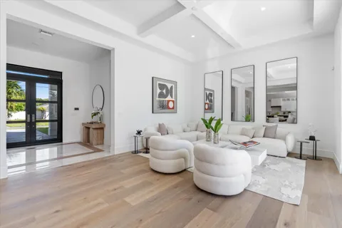 a living room with furniture and window