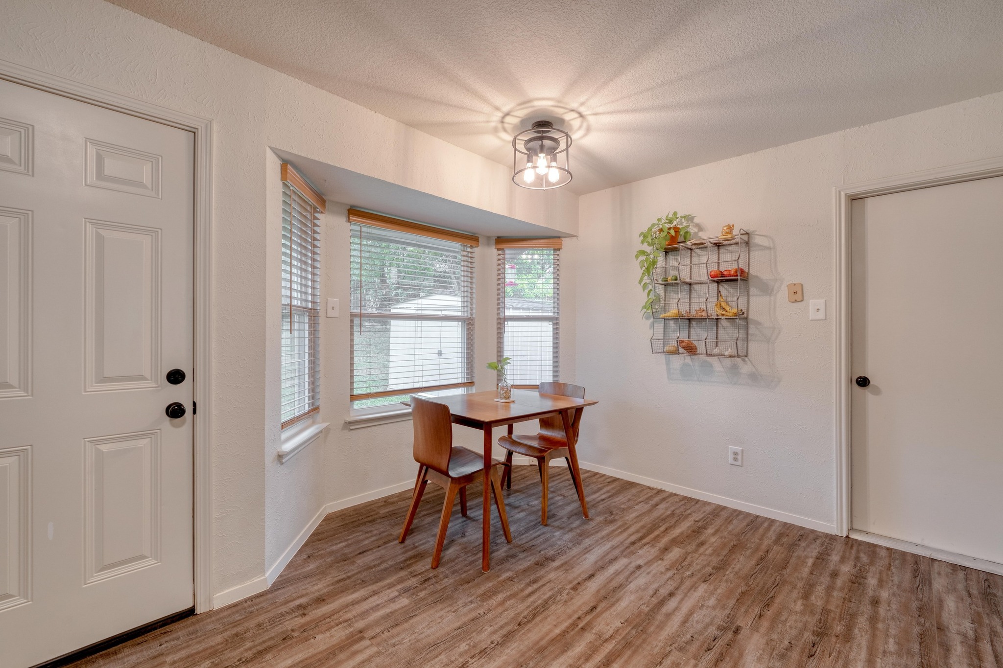 12030 Rotherham Drive Austin, TX 78753 - Photo 12 of 19 Charming bay window floods the dining space with natural light and backyard views.