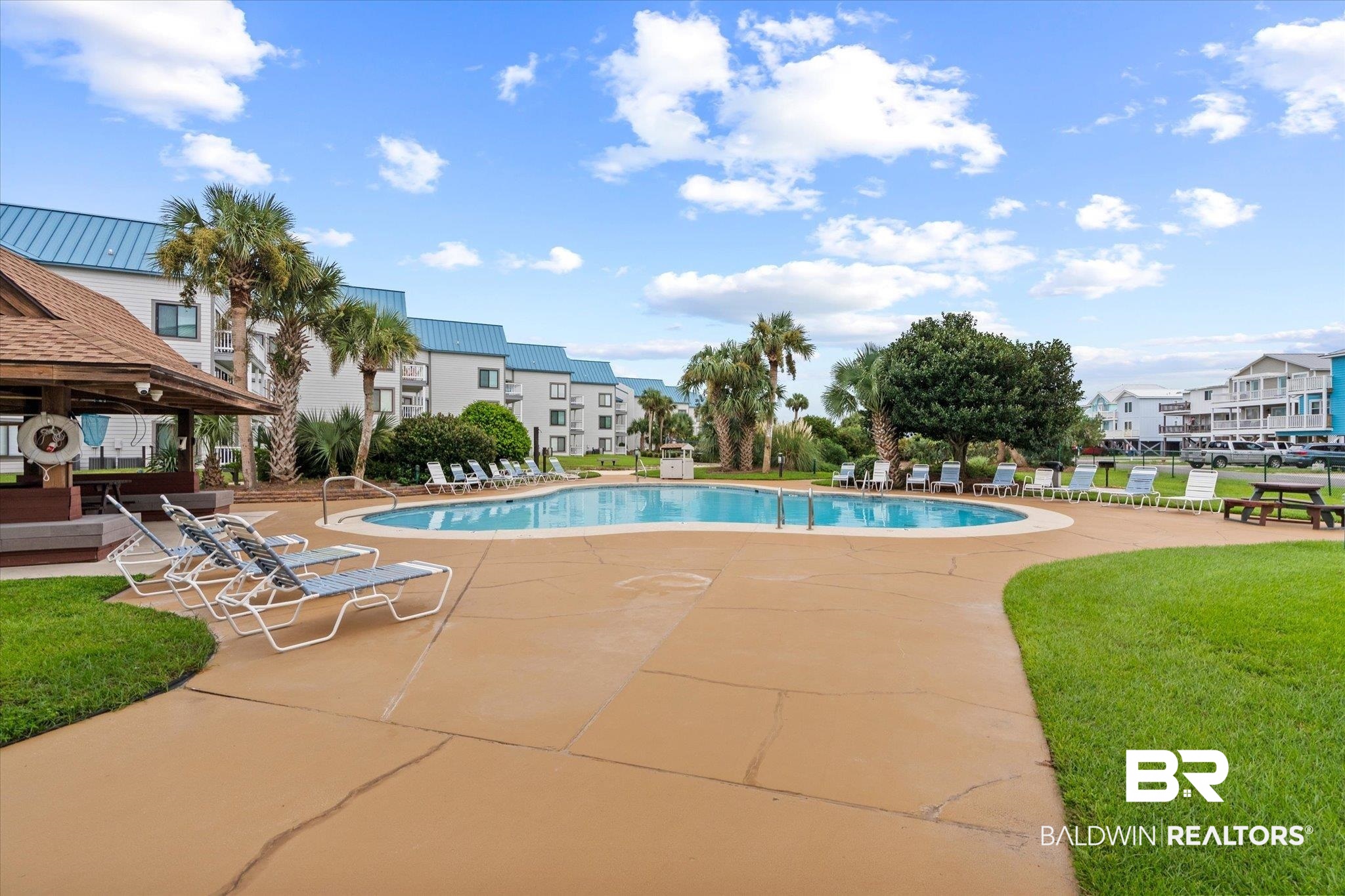 497 Plantation Road, Unit 1164 Gulf Shores, AL 36542 - Photo 19 of 20 View of swimming pool with a patio area and a lawn