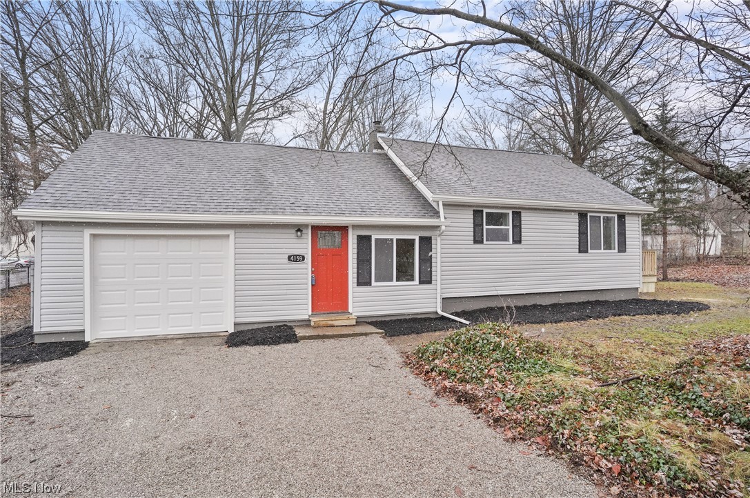 4159 Darrow Road Stow, OH 44224 - Photo 1 of 23 View of front of home with a garage