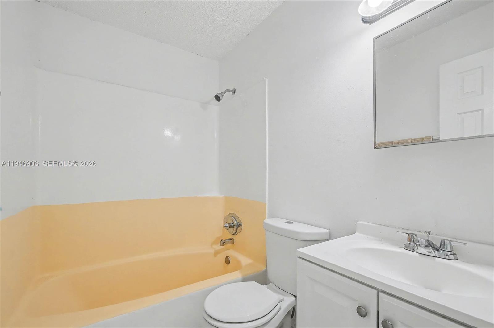 5510 Northwest 24th Street Lauderhill, FL 33313 - Photo 19 of 25 a bathroom with a sink toilet and bathtub
