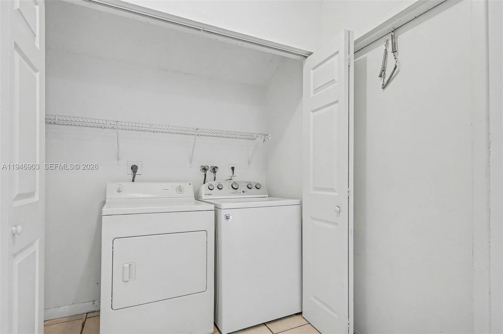 5510 Northwest 24th Street Lauderhill, FL 33313 - Photo 21 of 25 a utility room with dryer and washer